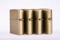 Line of gold lighters Royalty Free Stock Photo