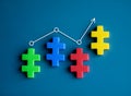 Line graph with arrow on multicolor jigsaw puzzle blocks as a business chart on blue background. Royalty Free Stock Photo