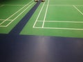 Line on green badminton court