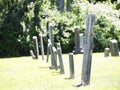 Line of head stones in a grave yard Royalty Free Stock Photo