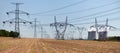 Line of high voltage electricity and nuclear power plant Royalty Free Stock Photo