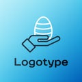 Line Human hand and easter egg icon isolated on blue background. Happy Easter. Colorful outline concept. Vector Royalty Free Stock Photo