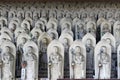 Line of hundreds of Buddha jizo statues at Reisenji Buddhist Temple Royalty Free Stock Photo