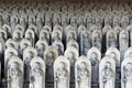 Line of hundreds of Buddha jizo statues at Reisenji Buddhist Temple