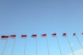 A line of Indonesian flags with the sky as the background. the theme of Indonesia`s independence day. commemoration of heroes day