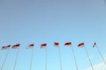 A line of Indonesian flags with the sky as the background. the theme of Indonesia`s independence day. commemoration of heroes day