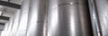 Line of industrial chemical tanks in chemical pharmaceutical production Royalty Free Stock Photo