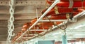 Line of lifebuoy ring floatation inside a traveler ship . Blurry background with copy space for text