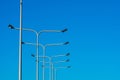 Light Posts Against Blue Sky