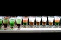 Line of many alcoholic shooters Royalty Free Stock Photo