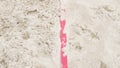 Line markings on the sand for beach volleyball on the street