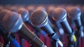 A line of microphones waiting to take the stage nervously adjusting their ties and practicing their best diva poses