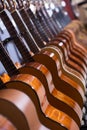 Line of new acoustic guitars in store Royalty Free Stock Photo