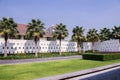 Line of palm tree at public park with blue sky Royalty Free Stock Photo