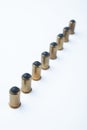 Line of rubber bullets and cartridges in a row