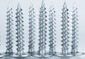 Line of silver screws toned grey Royalty Free Stock Photo