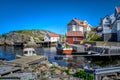 Line of simple white houses in the port of Sweden Royalty Free Stock Photo