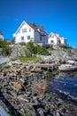 Line of simple white houses in the port of Sweden Royalty Free Stock Photo