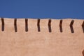 Line of Timbers in Adobe Wall Royalty Free Stock Photo