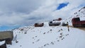 Line of trucks waiting to pass the slippery and narrow street at Trola Pass