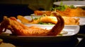 British Deep Fried Battered Fish Fillets with Green Herbs Royalty Free Stock Photo