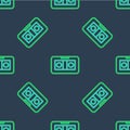 Line VHS video cassette tape icon isolated seamless pattern on blue background. Vector Royalty Free Stock Photo