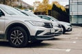 Line of Volkswagen Tiguan cars parked in a row Royalty Free Stock Photo