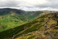 Line of walkers on Helm Crag Royalty Free Stock Photo