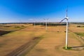 A line of wind turbines in Europe. Landscape with wind generators. The issue of energy saving in the modern world