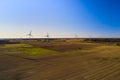 A line of wind turbines in Lithuania. The issue of energy saving in the modern world