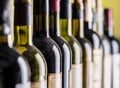 Line of wine bottles. Close-up. Royalty Free Stock Photo