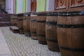 Line of wooden wine container storage barrels