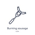 Linear burning sausage on a fork icon from Food outline collection. Thin line burning sausage on a fork icon isolated on white Royalty Free Stock Photo