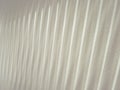 Linear light pattern from vertical blinds.