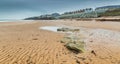 The linear patterns on the sand caused by the outgoing tide in Whitley Bay, England Royalty Free Stock Photo