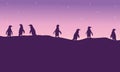 Lined penguin on hil scenery silhouette