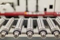 Lined up magnetic cylinders for die cut on rotary printing press. Magnetic cylinder for flexo rotary die cutting. Royalty Free Stock Photo