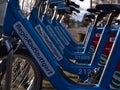 Lined up rental bikes in blue color of bicycle sharing system Regiorad Stuttgart standing at rental station in Degerloch. Royalty Free Stock Photo