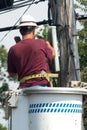 Lineman talking on a touchtone