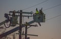 Lineman working in telephone poles Royalty Free Stock Photo