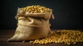 Linen bags filled with soybeans arranged on a wooden table Royalty Free Stock Photo