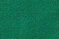 The linen cloth in green color. Fabric background texture. Detail of textile material close-up Royalty Free Stock Photo