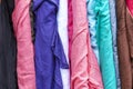 Bolts of different colour linen fabric on display. Royalty Free Stock Photo