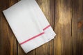 Linen kitchen towel over grunge baking tray Royalty Free Stock Photo