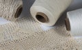 Linen lace with spools of thread Royalty Free Stock Photo