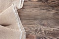 Linen napkin on a wooden table. View top.