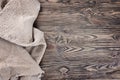 Linen napkin on a wooden table. View top.