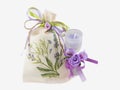Linen sack and aroma candle in glass decorated