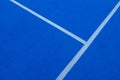 Lines of a blue synthetic grass paddle tennis court Royalty Free Stock Photo