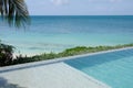 Lines formed by infinity pool and horizon at Cocobay